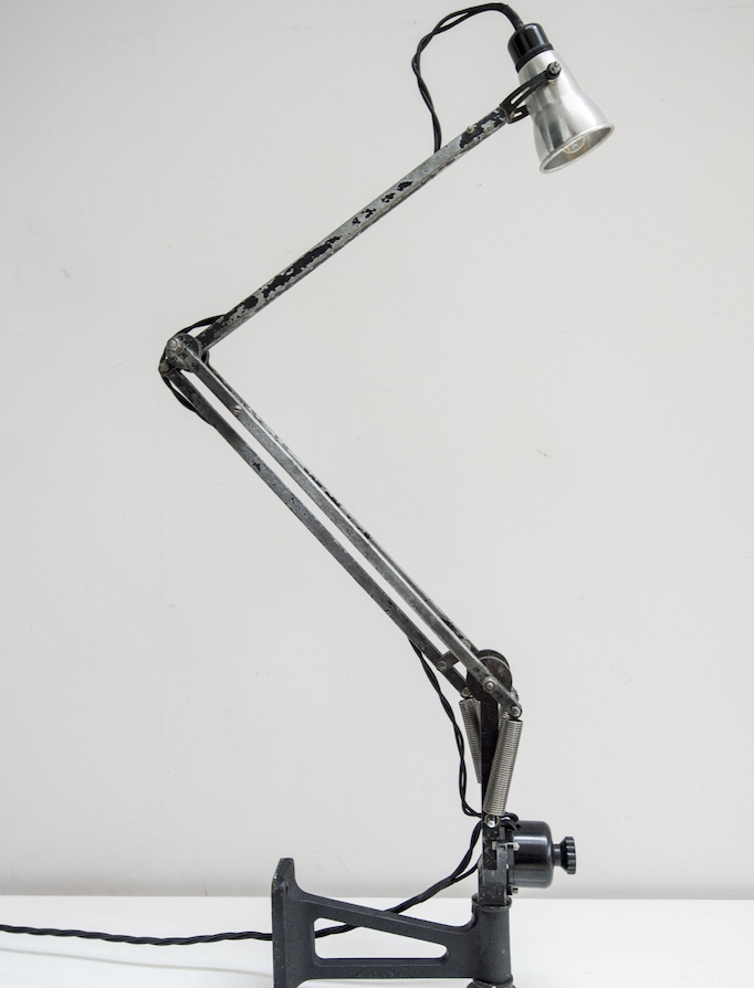 Anglepoise lamp restored from a Wellington bomber plane and white background