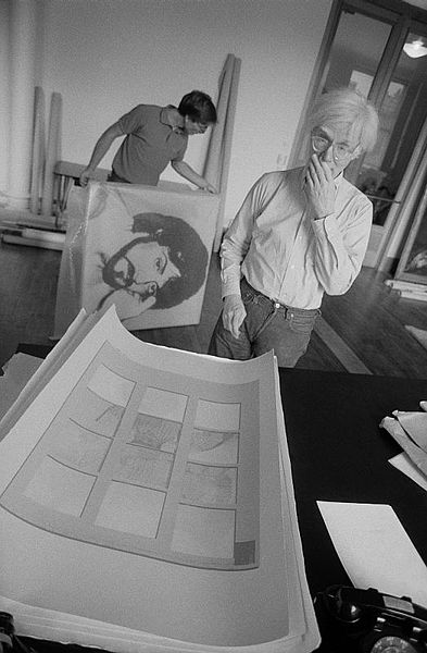 Andy Warhol looking at Thomas Dellert banana split, 1980 by Bruno Ehrs